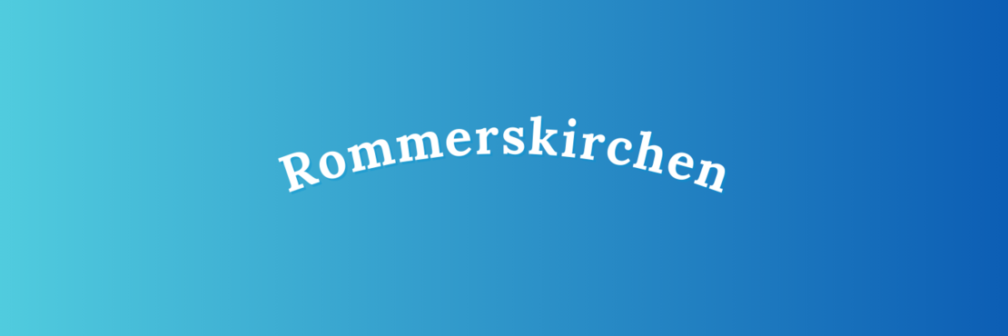 weißer Schriftzug "Rommerskirchen" vor blauem Grund