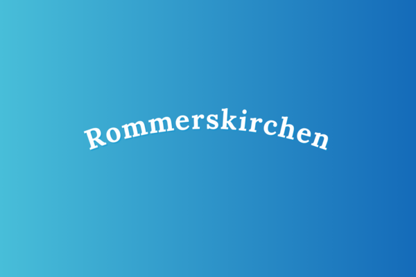 weißer Schriftzug "Rommerskirchen" vor blauem Grund