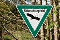 Foto von einem Hinweisschild mit der Aufschrift Naturschutzgebiet