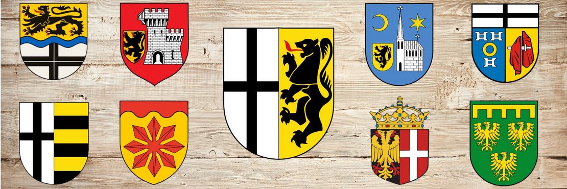 Alle Wappen auf einem Holzhintergrund